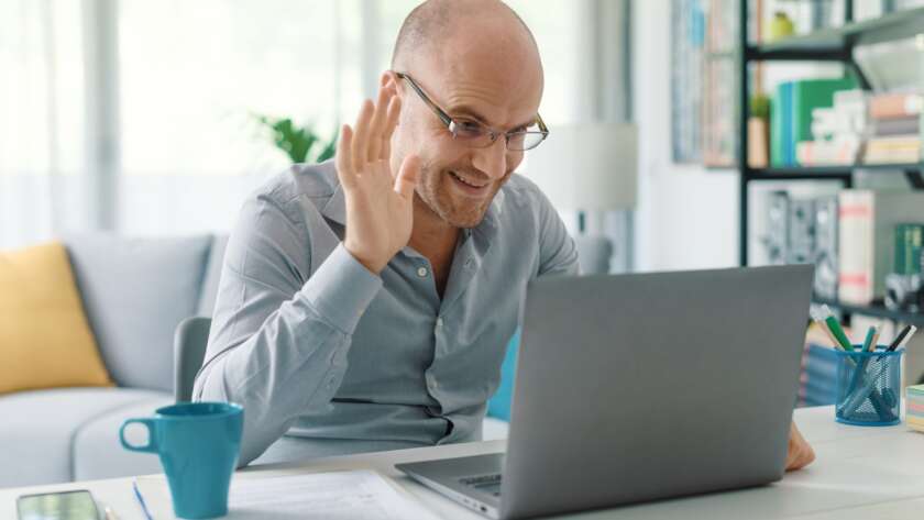 Businessman working from home and video conferencing
